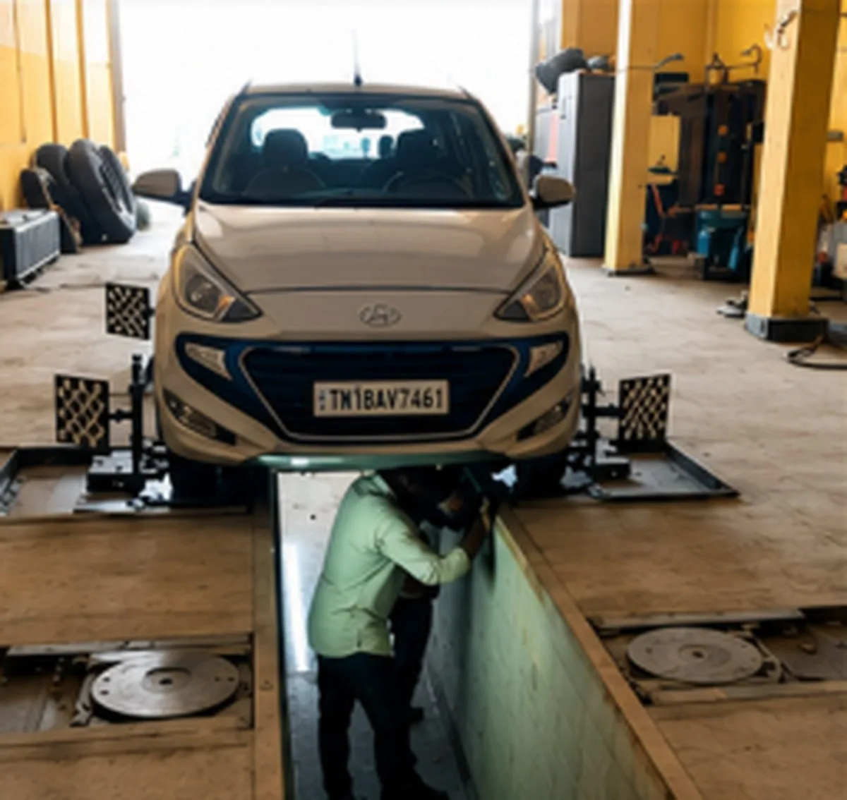 Car on 3D wheel alignment platform at Barani Enterprises