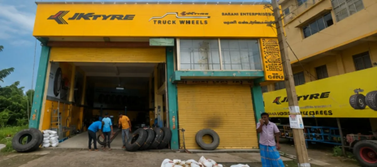 JK Tyre Truck Wheels shop front of Barani Enterprises with truck tyres outside